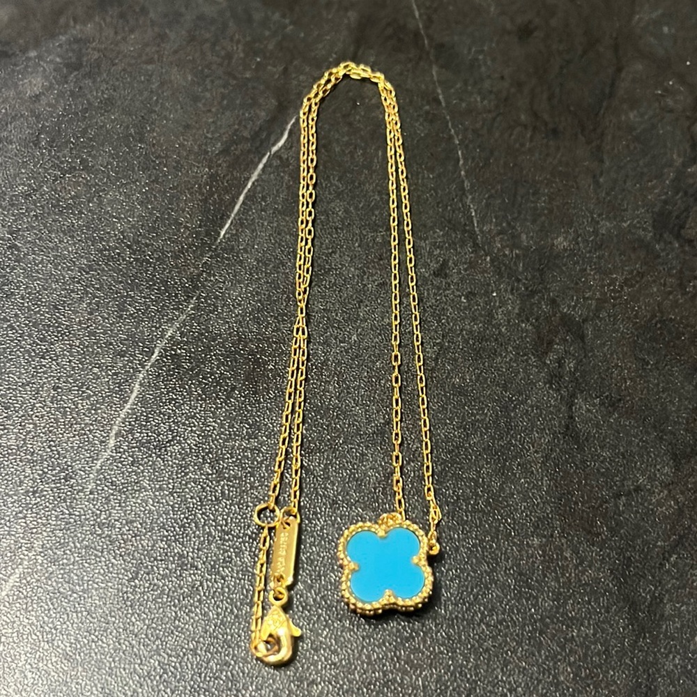 Women’s replica clover pendant